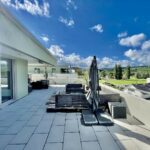 Attikawohnung mit Seesicht, riesiger Terrasse und günstiger Hypothek