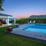 Design-Oase mit Pool, Palmen und traumhaftem Rigi-Panoramablick