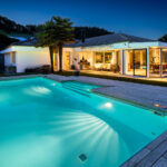 Design-Oase mit Pool, Palmen und traumhaftem Rigi-Panoramablick
